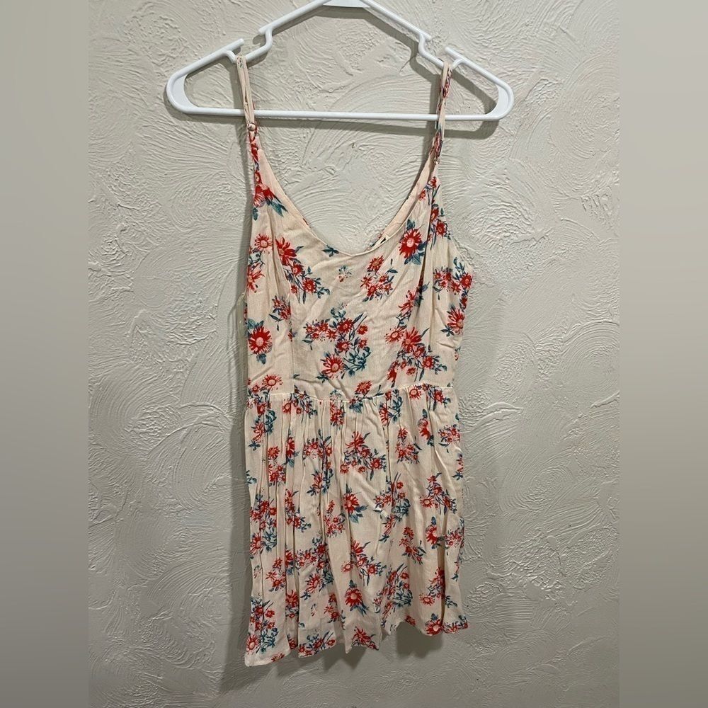 La hearts open back floral mini dress size medium